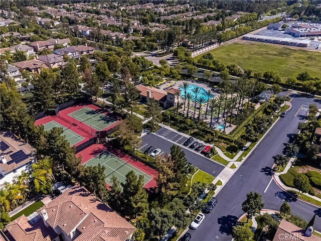 birds eye view of property with a residential view