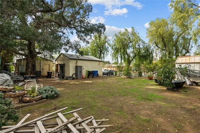 12626 Cometa Ave, San Fernando, CA 91340 - view of yard with an outdoor structure