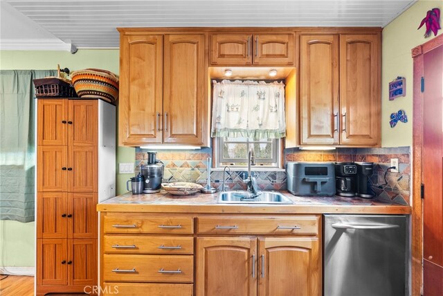 12626 Cometa Ave, San Fernando, CA 91340 - kitchen featuring a sink, tasteful backsplash, stainless steel dishwasher, crown molding, and brown cabinetry