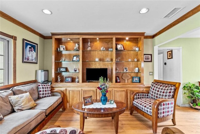 12626 Cometa Ave, San Fernando, CA 91340 - living area with ornamental molding, light wood finished floors, and recessed lighting