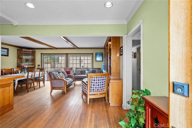 12626 Cometa Ave, San Fernando, CA 91340 - living area with wood finished floors, crown molding, and recessed lighting