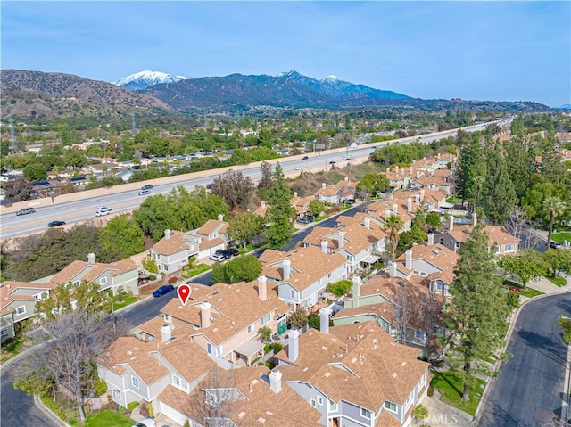 birds eye view of property featuring a residential view and a mountain view