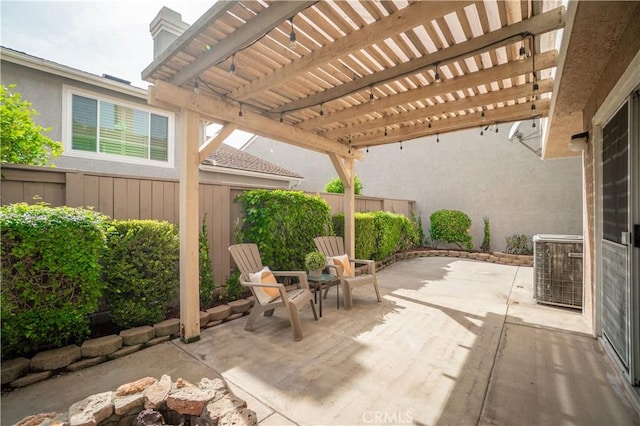 view of patio / terrace with central air condition unit, a pergola, and fence