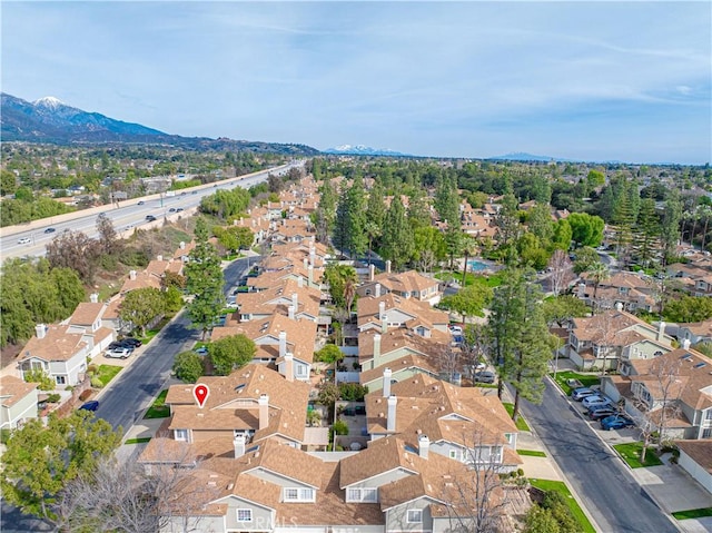 birds eye view of property featuring a residential view and a mountain view