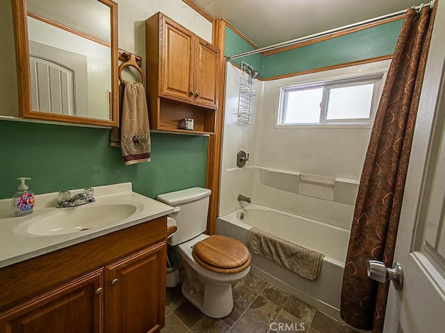 full bathroom featuring toilet, vanity, and shower / bathtub combination with curtain