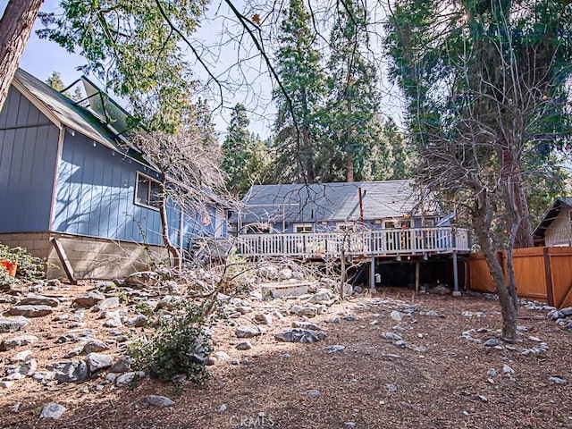 view of yard featuring a wooden deck