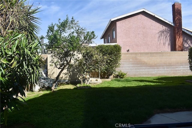 1041 E Riverside Dr, Ontario, CA 91761 - view of yard featuring a fenced backyard
