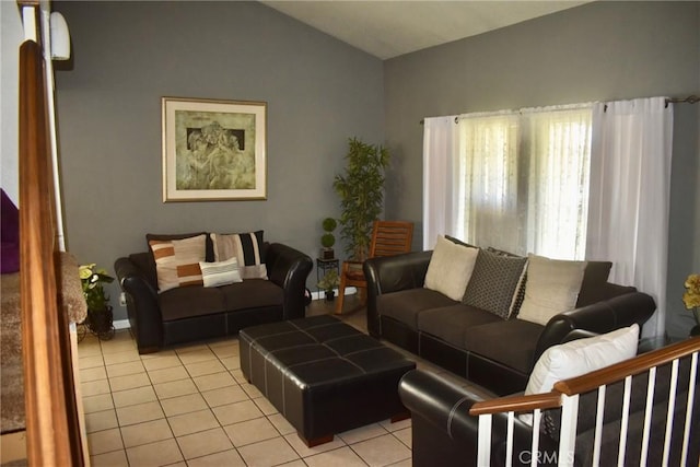 1041 E Riverside Dr, Ontario, CA 91761 - living room with light tile patterned floors and vaulted ceiling