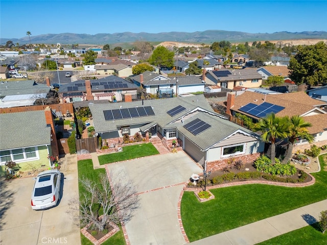 aerial view featuring a residential view and a mountain view