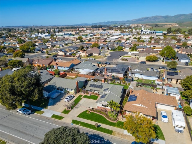 bird's eye view featuring a residential view and a mountain view