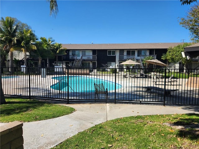 exterior space featuring a patio area and fence