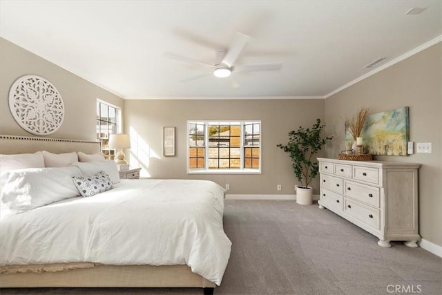 bedroom featuring baseboards, visible vents, ornamental molding, and light colored carpet