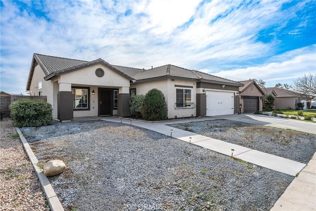 view of front of property with a garage