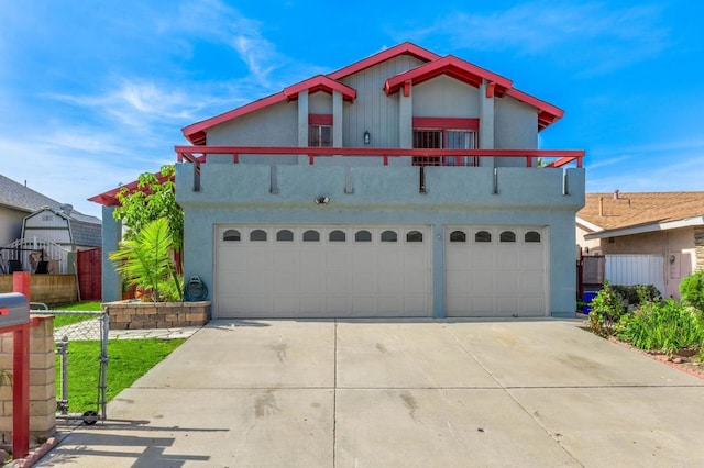 front of property featuring concrete driveway and stucco siding