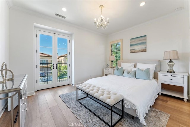 bedroom featuring ornamental molding, access to outside, french doors, and visible vents