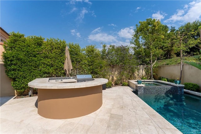 view of patio / terrace with a fenced in pool, grilling area, area for grilling, an in ground hot tub, and a fenced backyard