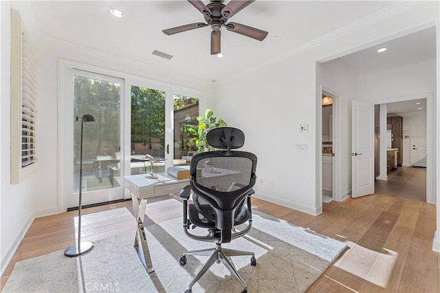 office featuring ornamental molding, light wood-type flooring, baseboards, and recessed lighting