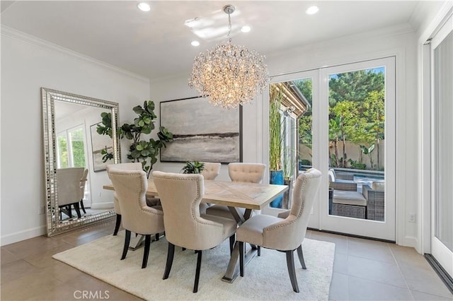 dining area featuring ornamental molding, recessed lighting, a notable chandelier, and baseboards