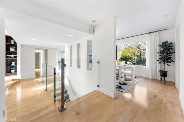 corridor featuring light hardwood / wood-style flooring