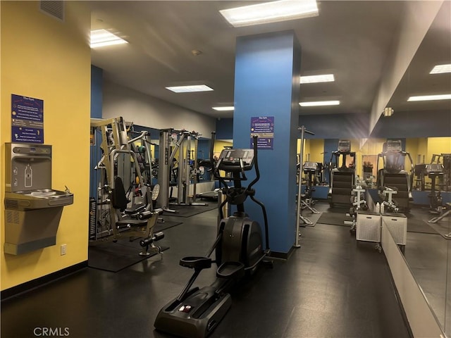 exercise room featuring visible vents