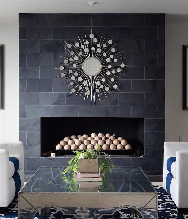 details with a tile fireplace