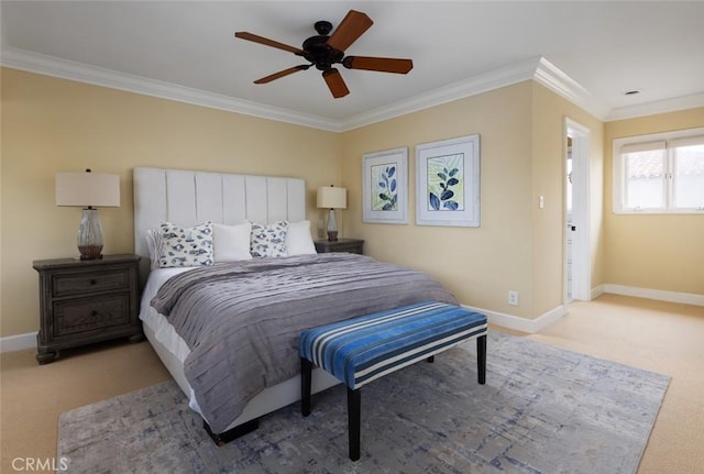 bedroom featuring ornamental molding, light colored carpet, and baseboards