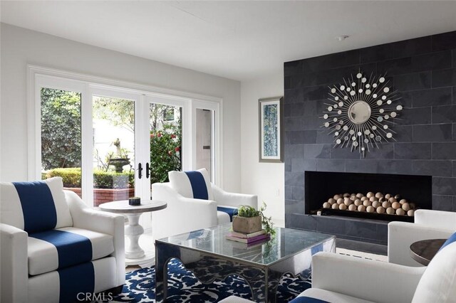 living area featuring a fireplace