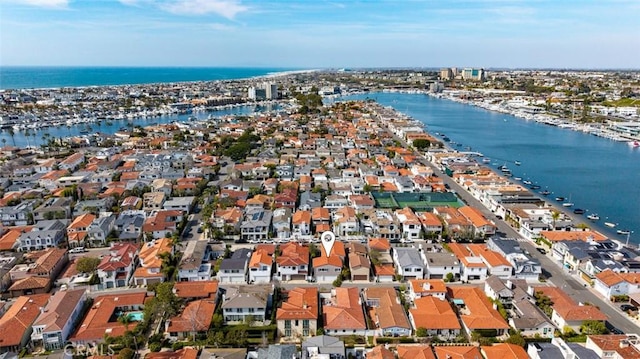 aerial view featuring a water view and a residential view