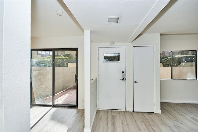 doorway featuring light hardwood / wood-style flooring