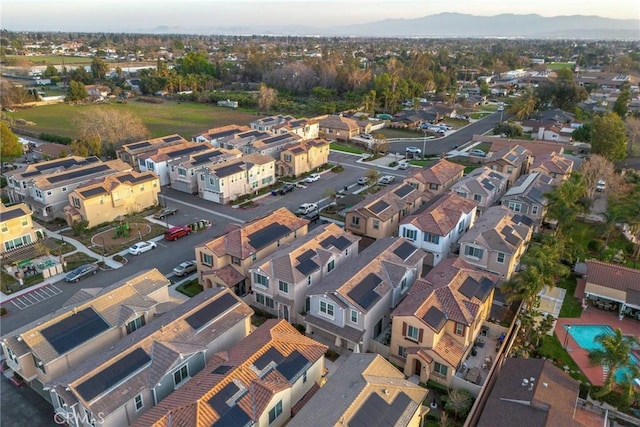 birds eye view of property with a residential view and a mountain view