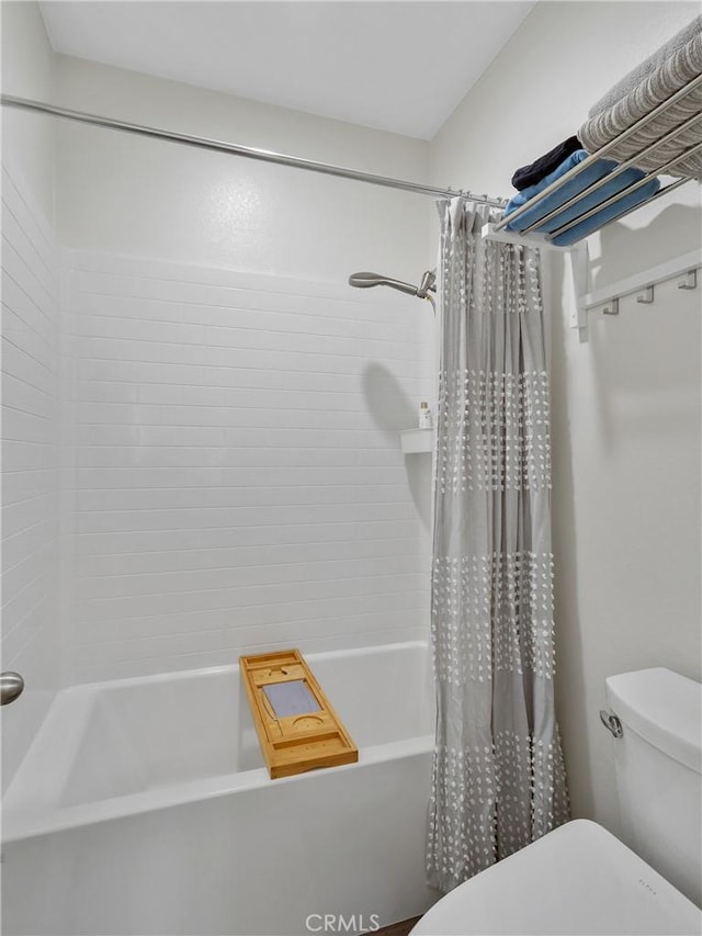 bathroom featuring shower / tub combo with curtain