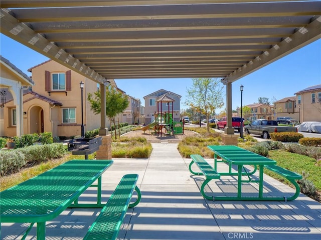 view of property's community featuring a residential view and playground community