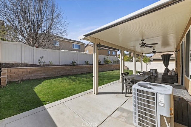 view of patio / terrace featuring outdoor dining area, cooling unit, a ceiling fan, and a fenced backyard