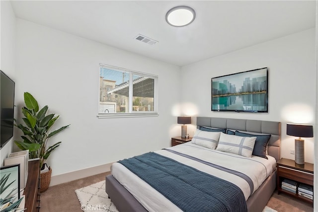 bedroom with carpet and visible vents