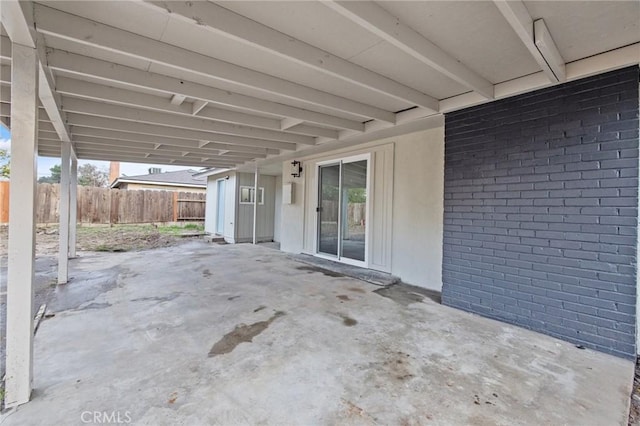 view of patio / terrace featuring fence