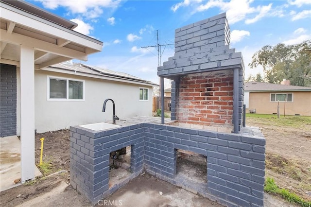 view of patio with a sink