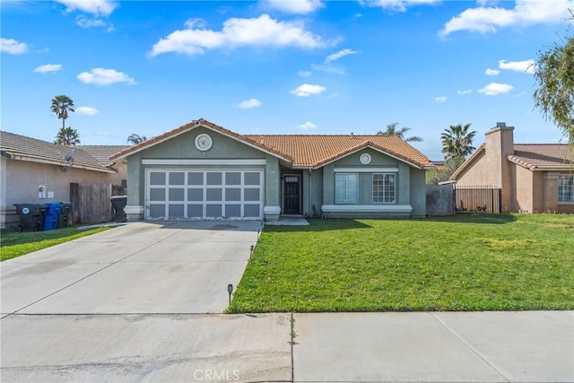 ranch-style home featuring a garage, a front yard, a tiled roof, and concrete driveway