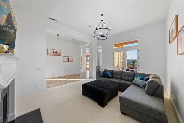 43840 E Vallejo Ave, Temecula, CA 92592 - carpeted living area featuring a chandelier, a premium fireplace, and baseboards