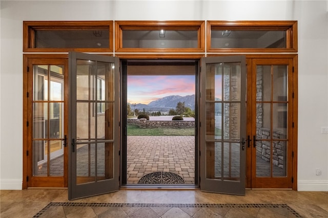 43840 E Vallejo Ave, Temecula, CA 92592 - doorway with french doors, baseboards, and a mountain view