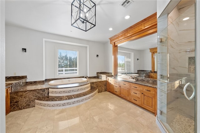 43840 E Vallejo Ave, Temecula, CA 92592 - full bath featuring a garden tub, vanity, a shower stall, recessed lighting, and tile patterned floors