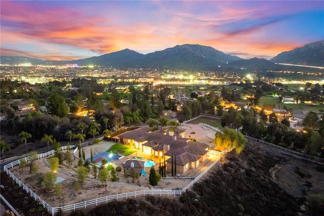 aerial view at dusk with a mountain view