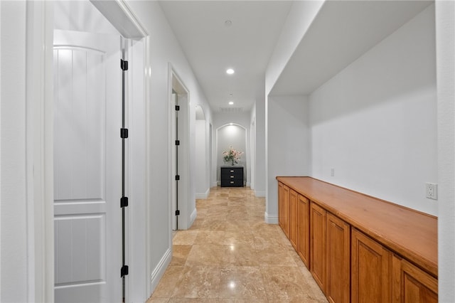 43840 E Vallejo Ave, Temecula, CA 92592 - corridor with arched walkways, recessed lighting, and baseboards
