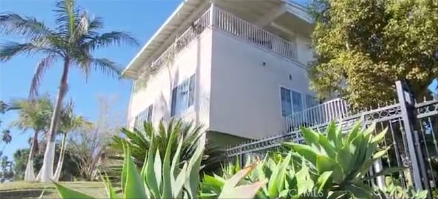 view of property exterior with stucco siding