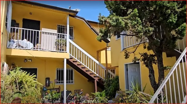 view of property with stairs