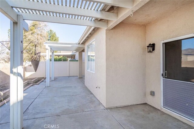 773 Camino De Plata, San Jacinto, CA 92583 - view of patio / terrace featuring fence and a pergola