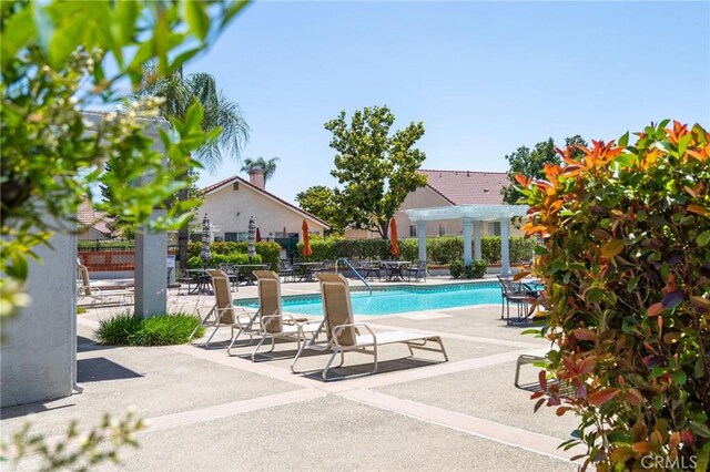 773 Camino De Plata, San Jacinto, CA 92583 - community pool with a pergola, a patio, and fence