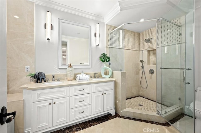 627 W Palm Dr, Arcadia, CA 91007 - bathroom with crown molding, a shower stall, inlaid floor details, toilet, and double vanity