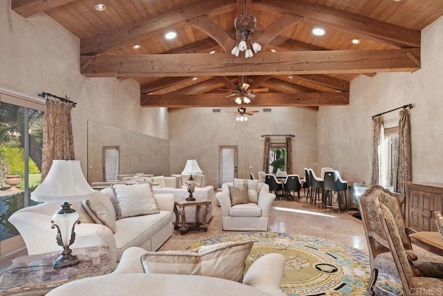 living area with high vaulted ceiling, wood ceiling, ceiling fan, and beam ceiling