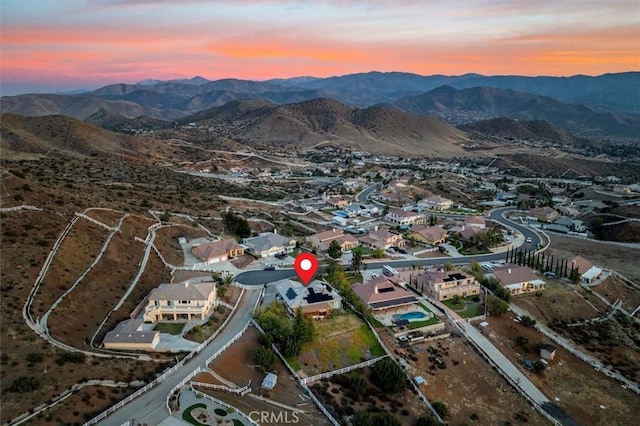 drone / aerial view with a residential view and a mountain view