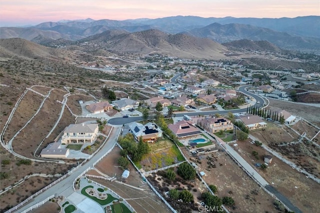 birds eye view of property with a residential view and a mountain view